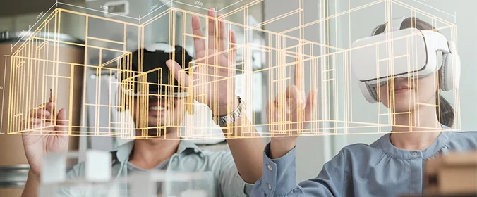 foto de duas pessoas com oculos de realidade aumentada e mexendo em hologramas de estruturas